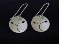 Sterling silver earrings with saw pierced design