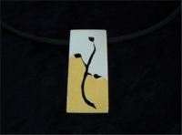 Sterling silver and 23ct gold leaf pendant on black PVC cord